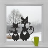 Gatitos en la ventana